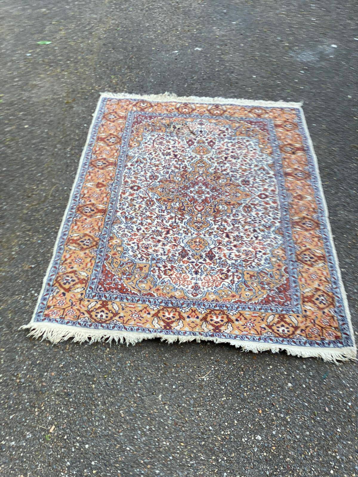 Handmade Persian rug in blue, beige, burgundy, and orange, 95x160cm.
