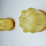 Pair of "cocoon" wall lights, resin and pine, Italy, 1970