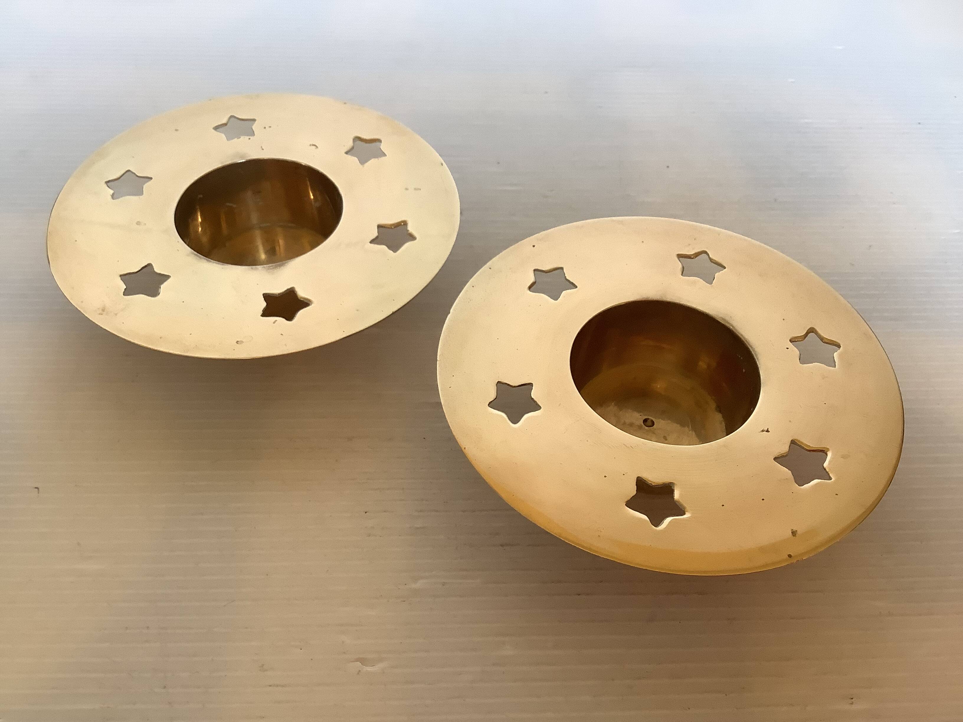 Pair of star candle holders in brass