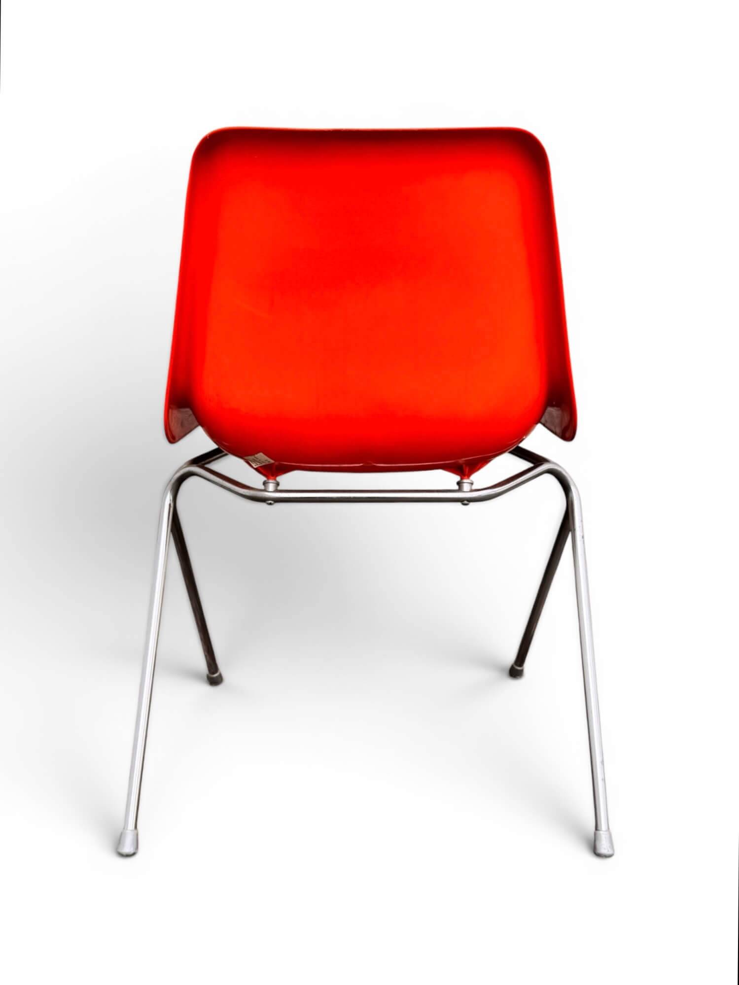Set of 4 orange chairs designed by Robin Day for Hille.