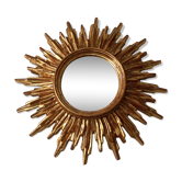 Golden carved wood sun mirror