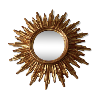 Miroir soleil en bois sculpté doré