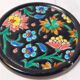 Ensemble émaux de Longwy dessous de plat et de bouteille décor floral