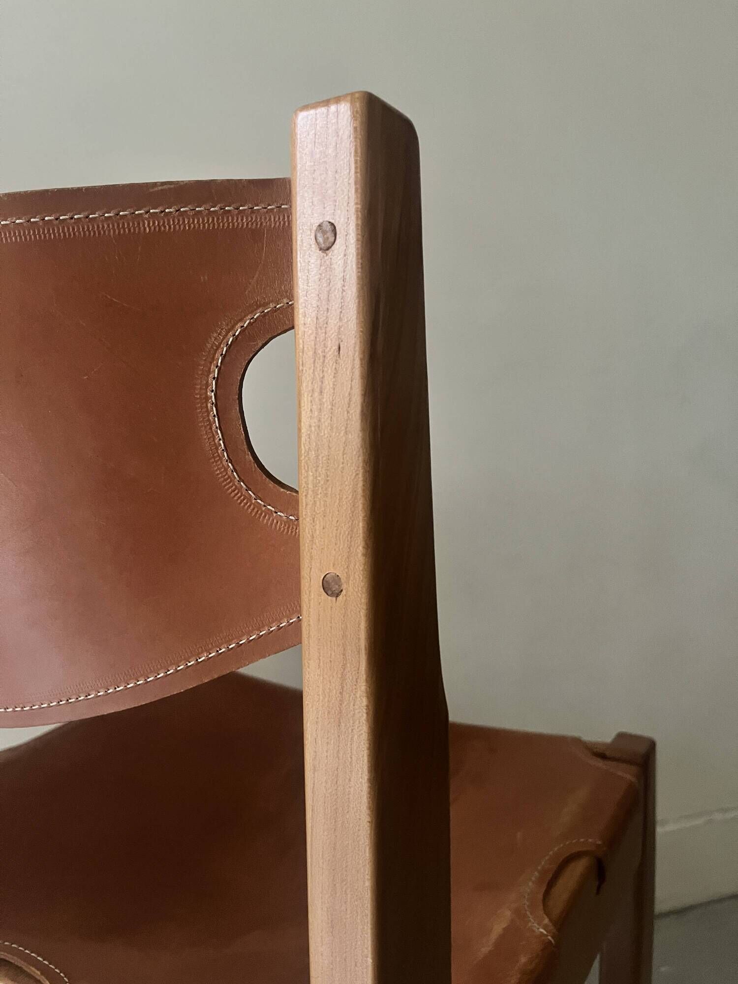elm wood and camel leather chair Maison Regain, French design 1960
