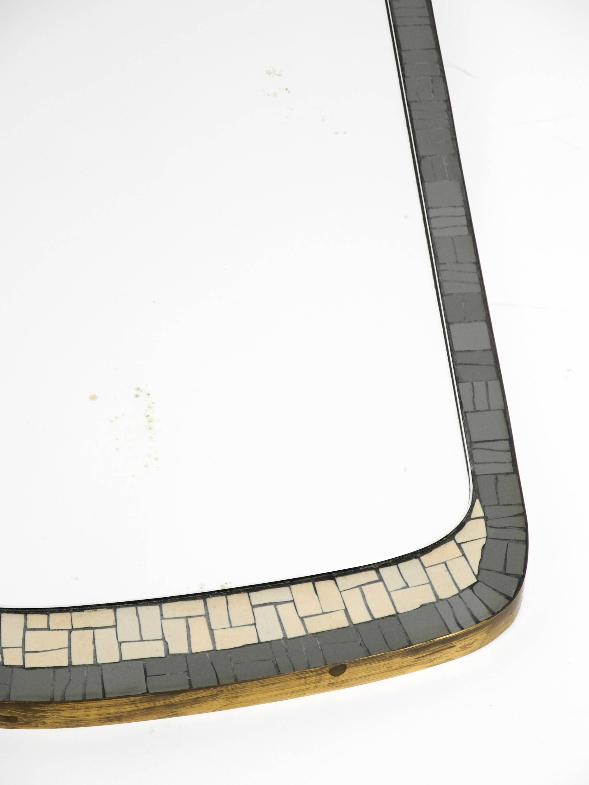 Mid Century mosaic wall mirror with brass frame by Münchner Zierspiegel