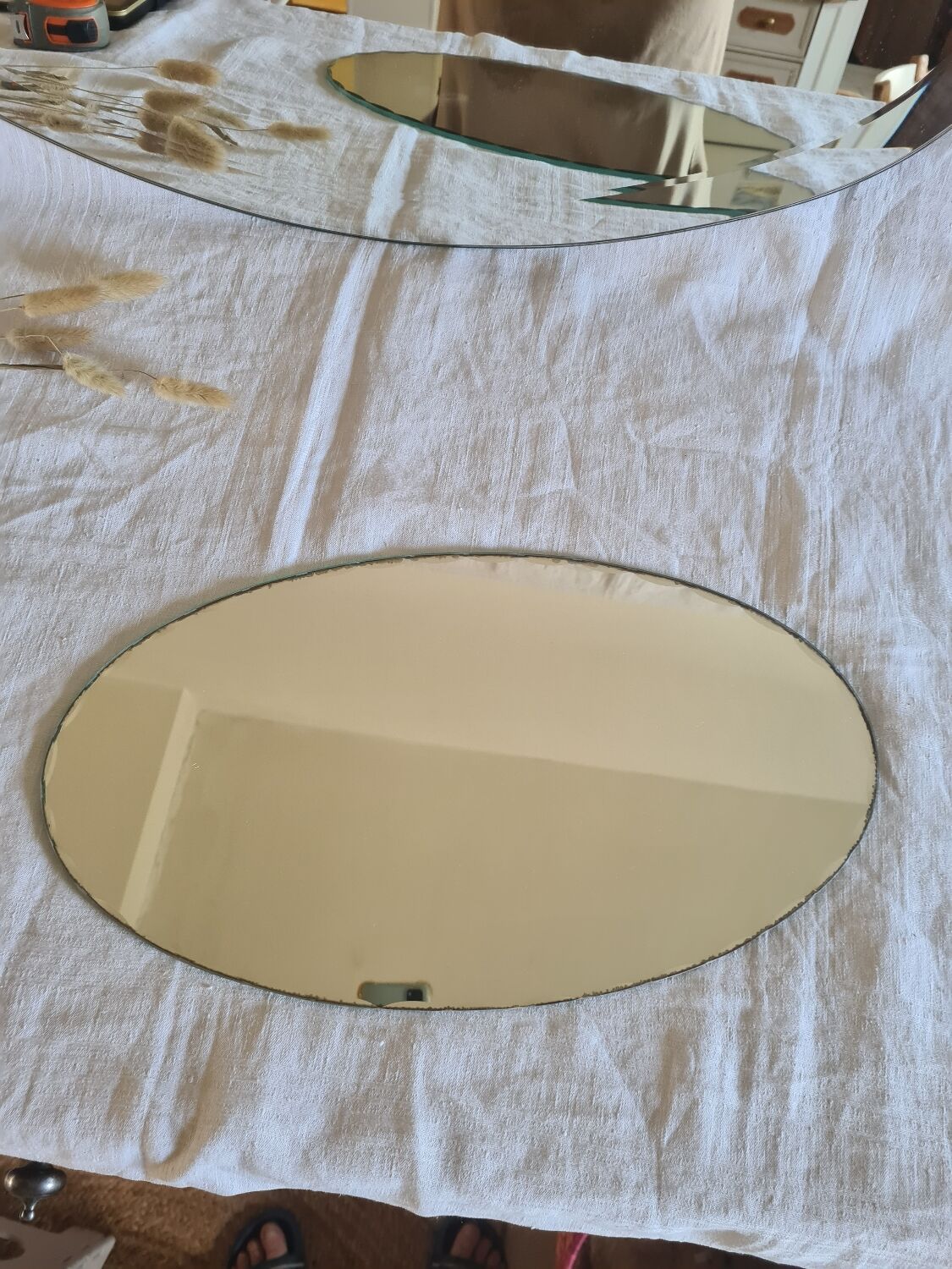 Beveled oval mirror