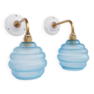 vintage brass and frosted blue glass wall lights