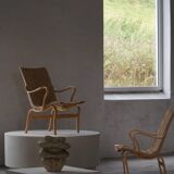 Pair of Swedish armchairs from the mid-century by Bruno Mathsson, model "Eva", 1960s.