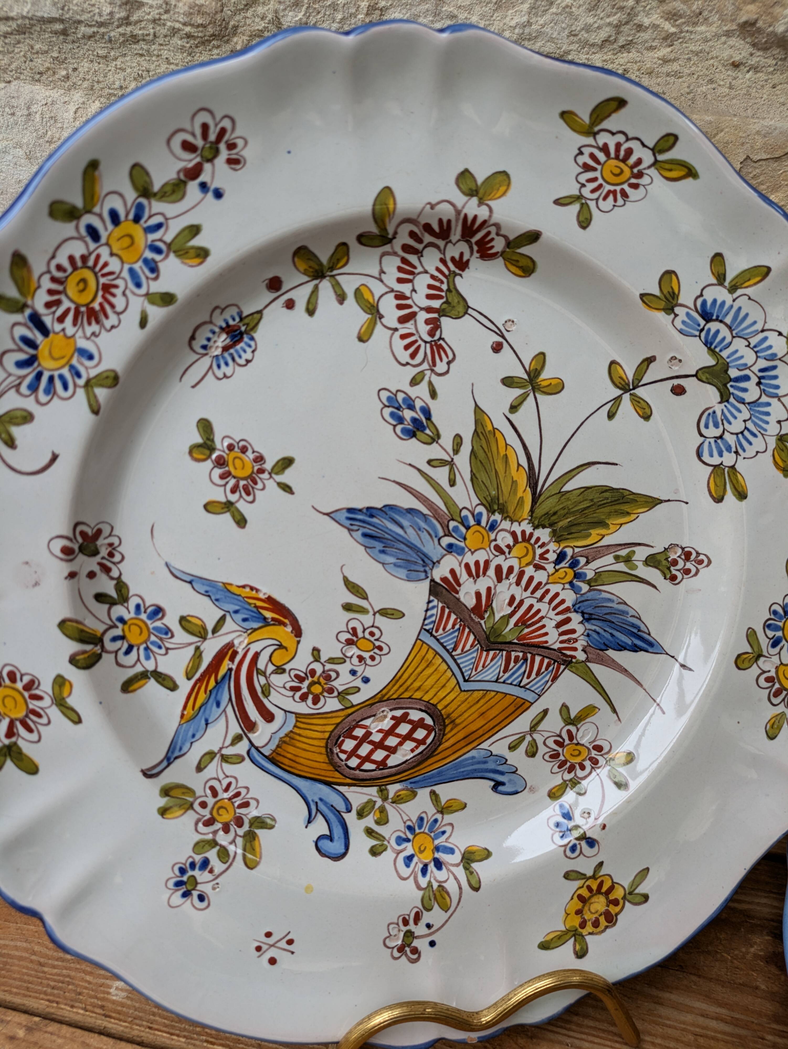 Set of 2 antique decorative plates with cornucopias