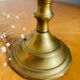 Old brass torch candle holder