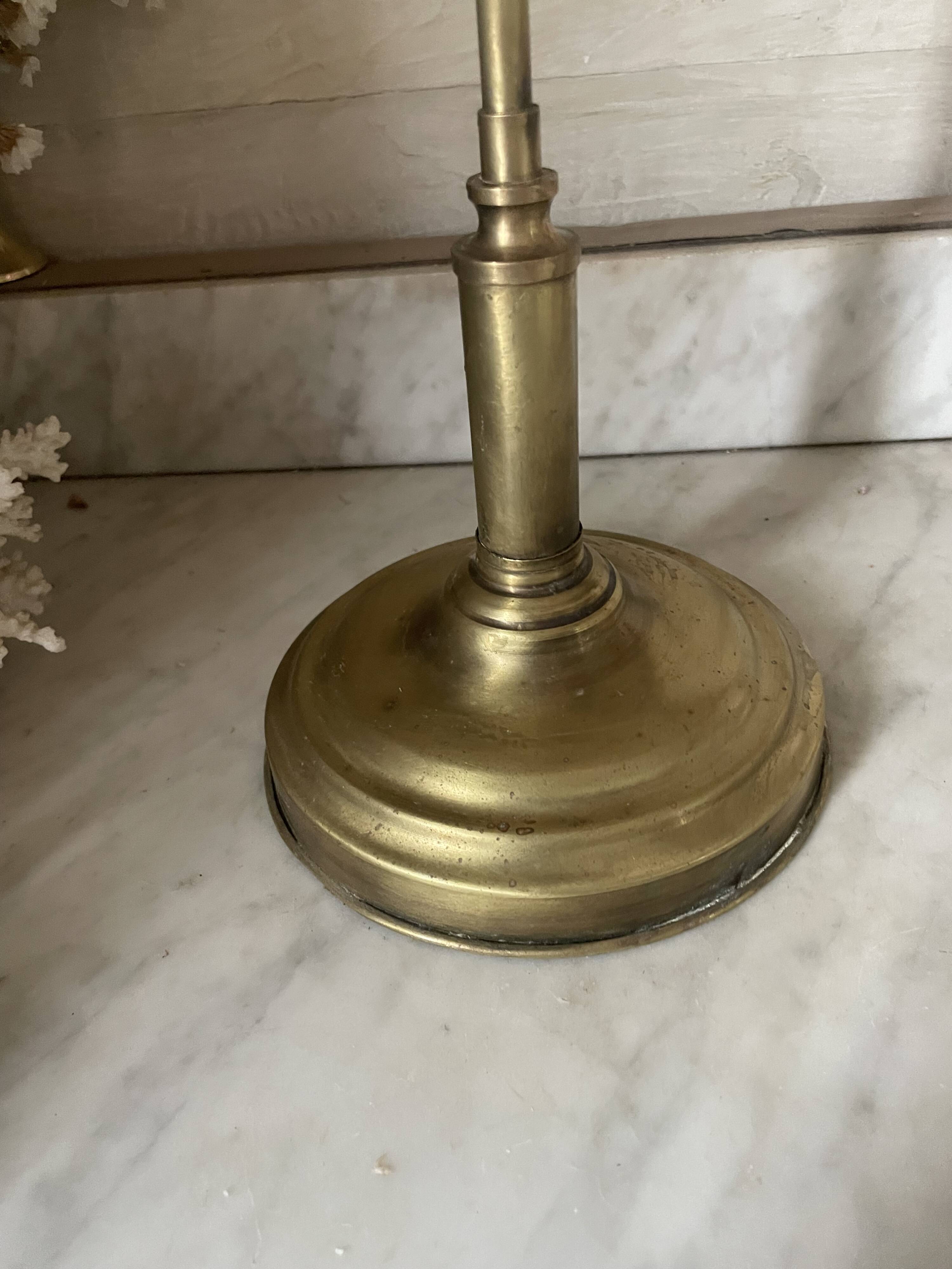 Large vintage lamp in brass with a pink opaline shade.