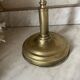 Large vintage lamp in brass with a pink opaline shade.