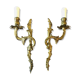 A pair of rococo gilded wall lights