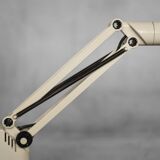 Beige plastic table lamp Lucifer, mid-century modern Scandinavian style.