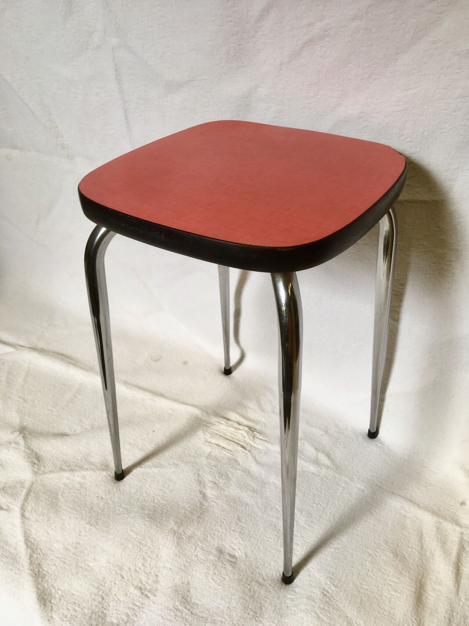 Vintage stool in red formica chrome feet