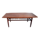 Danish 1960s teak coffee table with slatted shelf.