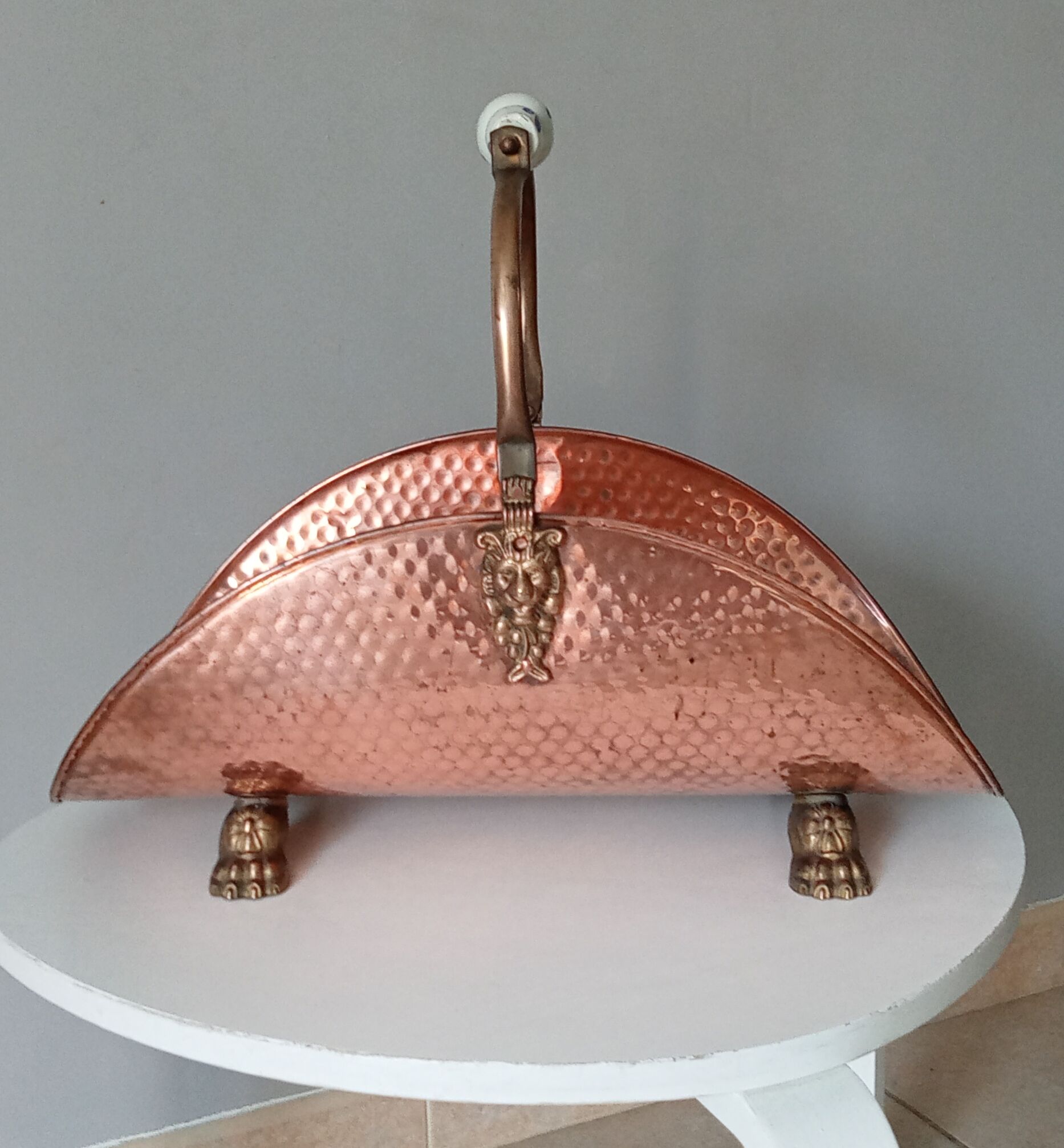 Old log holder in copper and brass