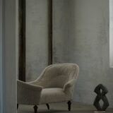 Antique Danish sculptural chaise longue from the 19th century, reupholstered in lambswool.