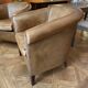 pair of camel leather club armchairs