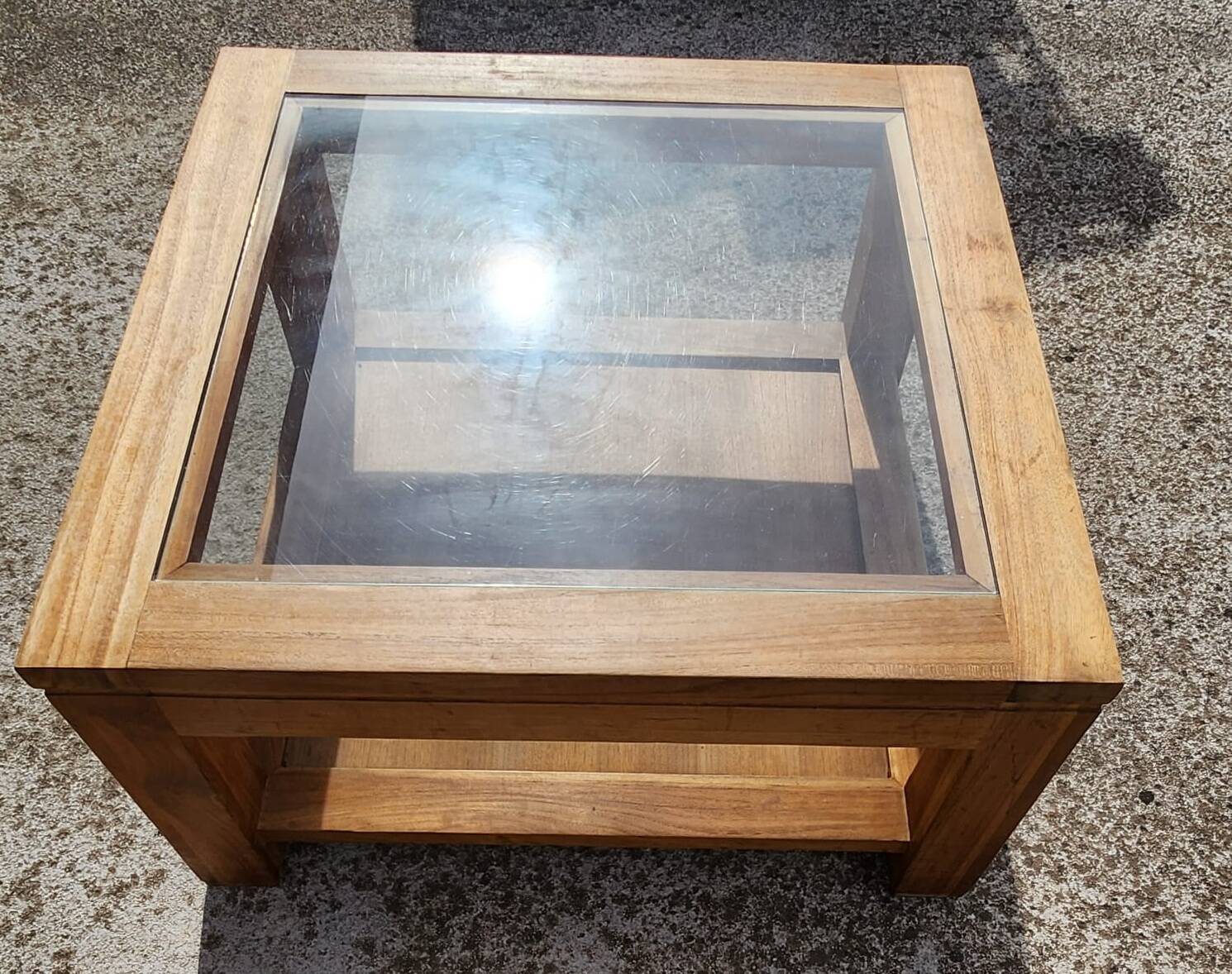 Glass coffee table in wood
