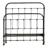 Read a wrought iron bed.