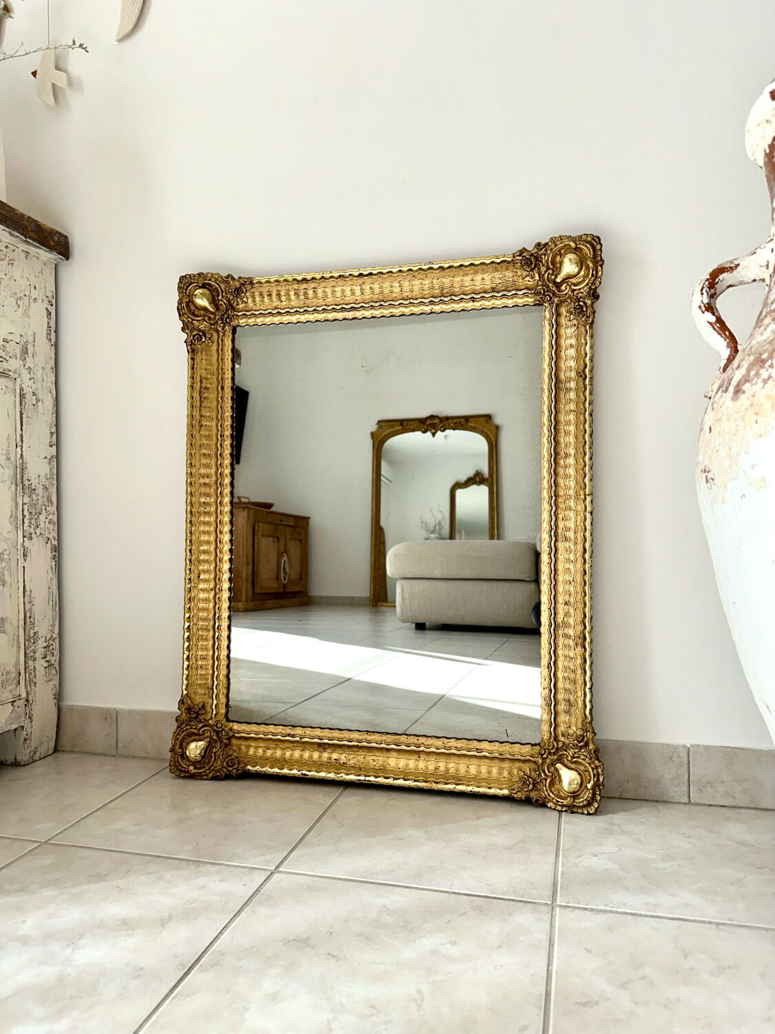 Mirror from the Restoration period, antique gilded, 19th century.