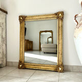 Mirror from the Restoration period, antique gilded, 19th century.