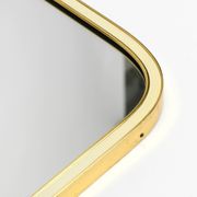 Large heavy long Mid Century brass wall mirror by Münchner Zierspiegel