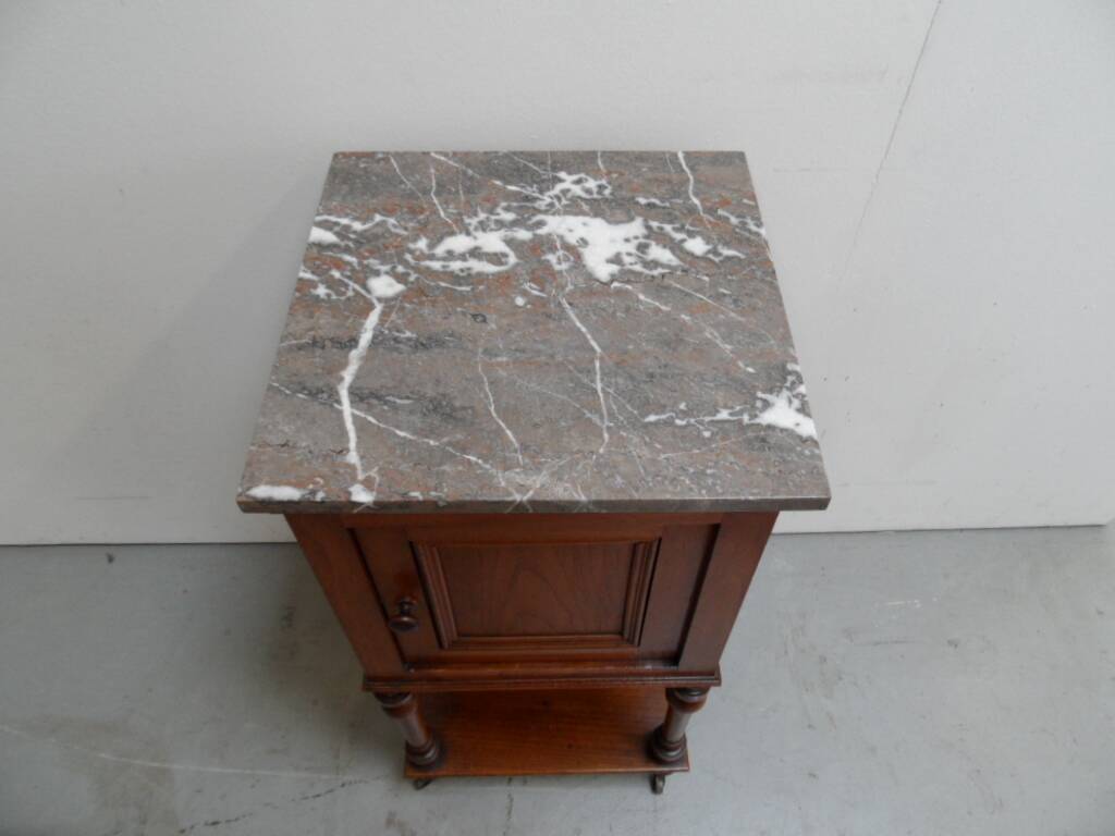 Antique nightstand with marble top