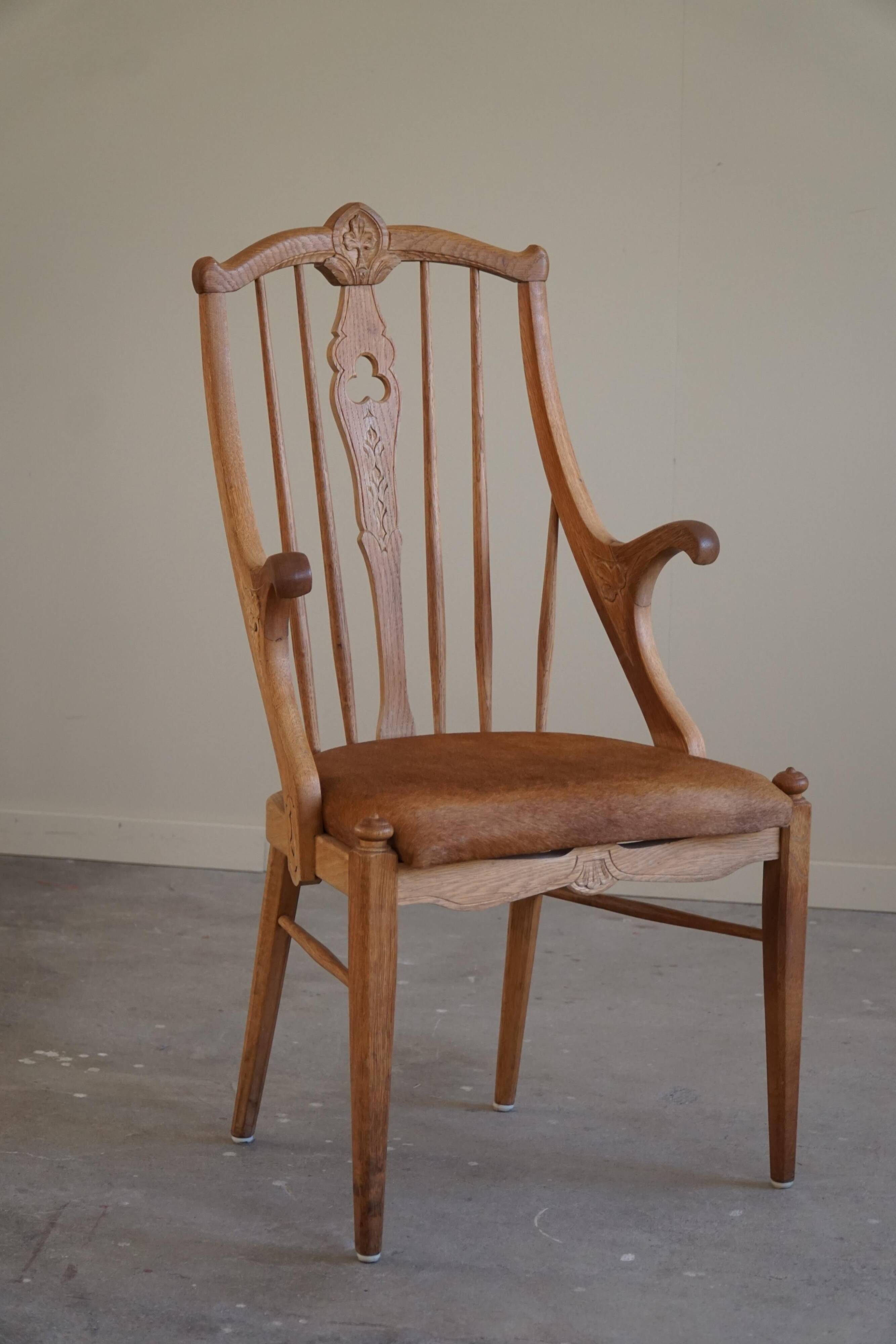 Danish high-back armchair in solid oak with leather cushion, mid-century, 1950s.