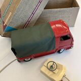 Red Renault estafette guided by a wire