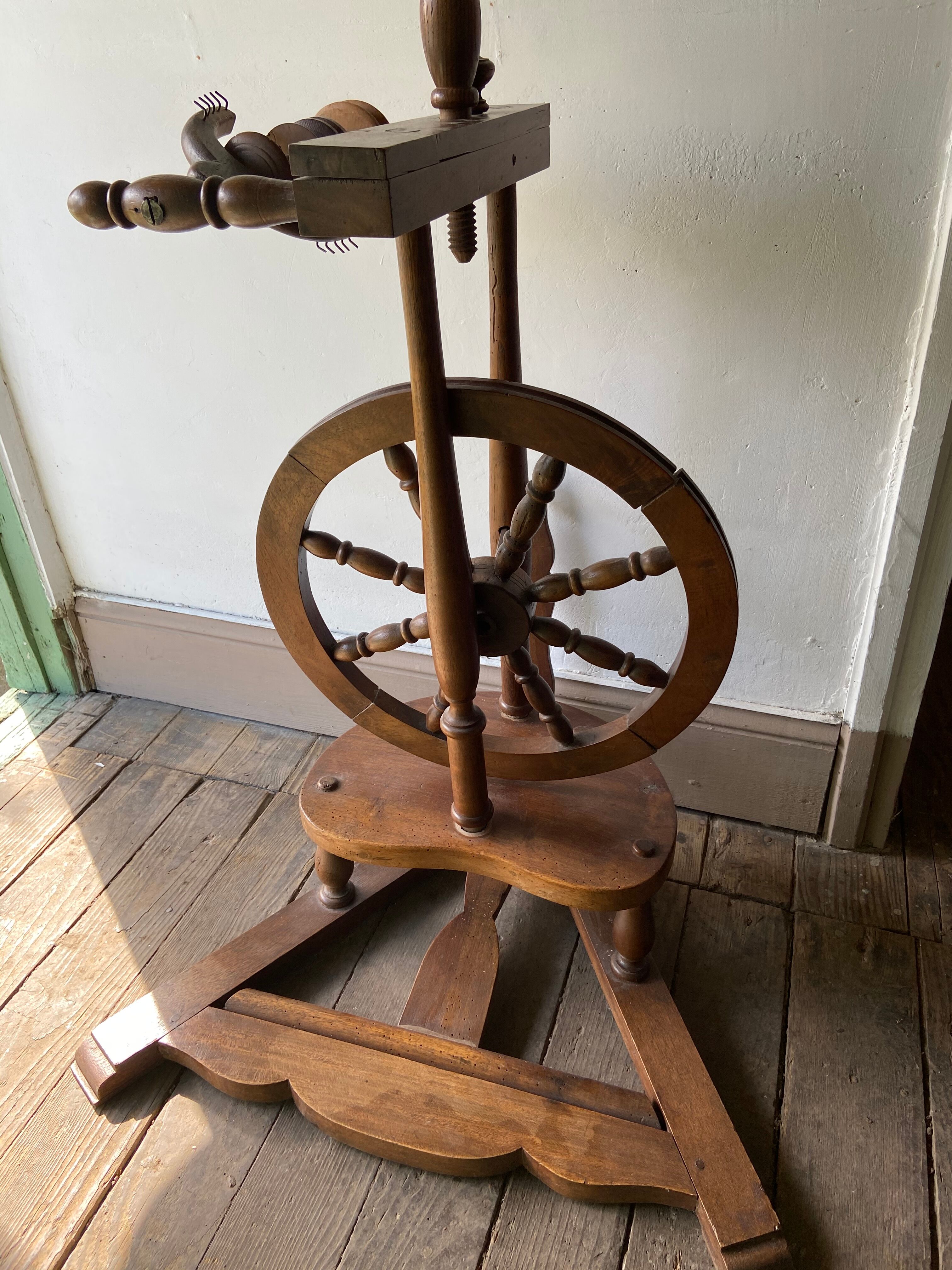 Wooden spinning wheel