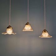 Trio of Art Deco grooved glass pendant lights, 1920s-30s