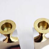 Pair of chromed metal and brass candlesticks
