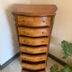 Rosewood weekly and curved marquetry on all three sides