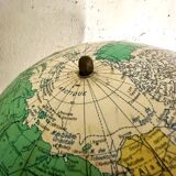 Globe on wooden stand, 20th century