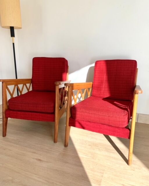 Pair of vintage wooden armchairs with braces