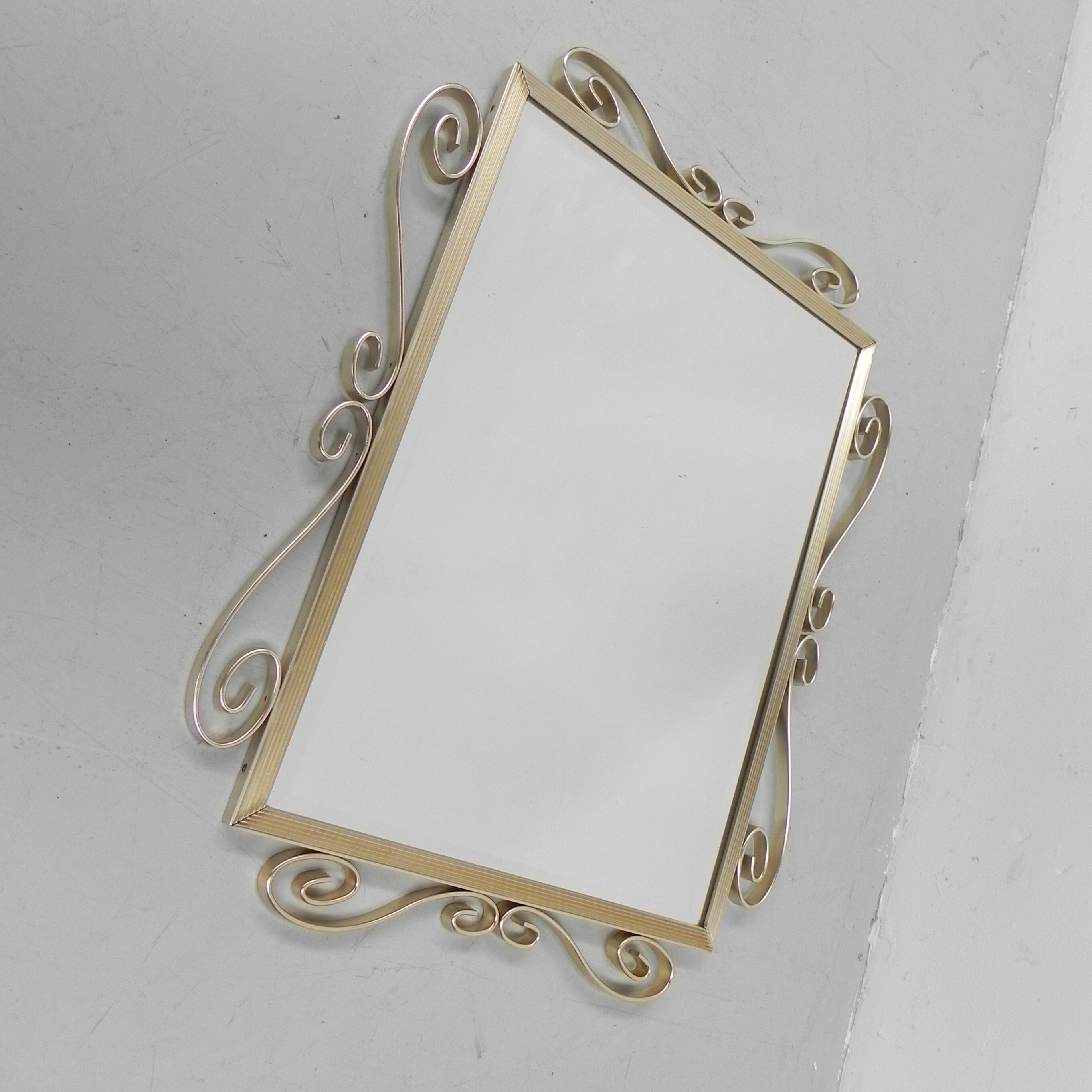 Vintage faceted mirror in aluminum frame
