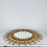 Vintage rattan sunburst mirror from the 1960s
