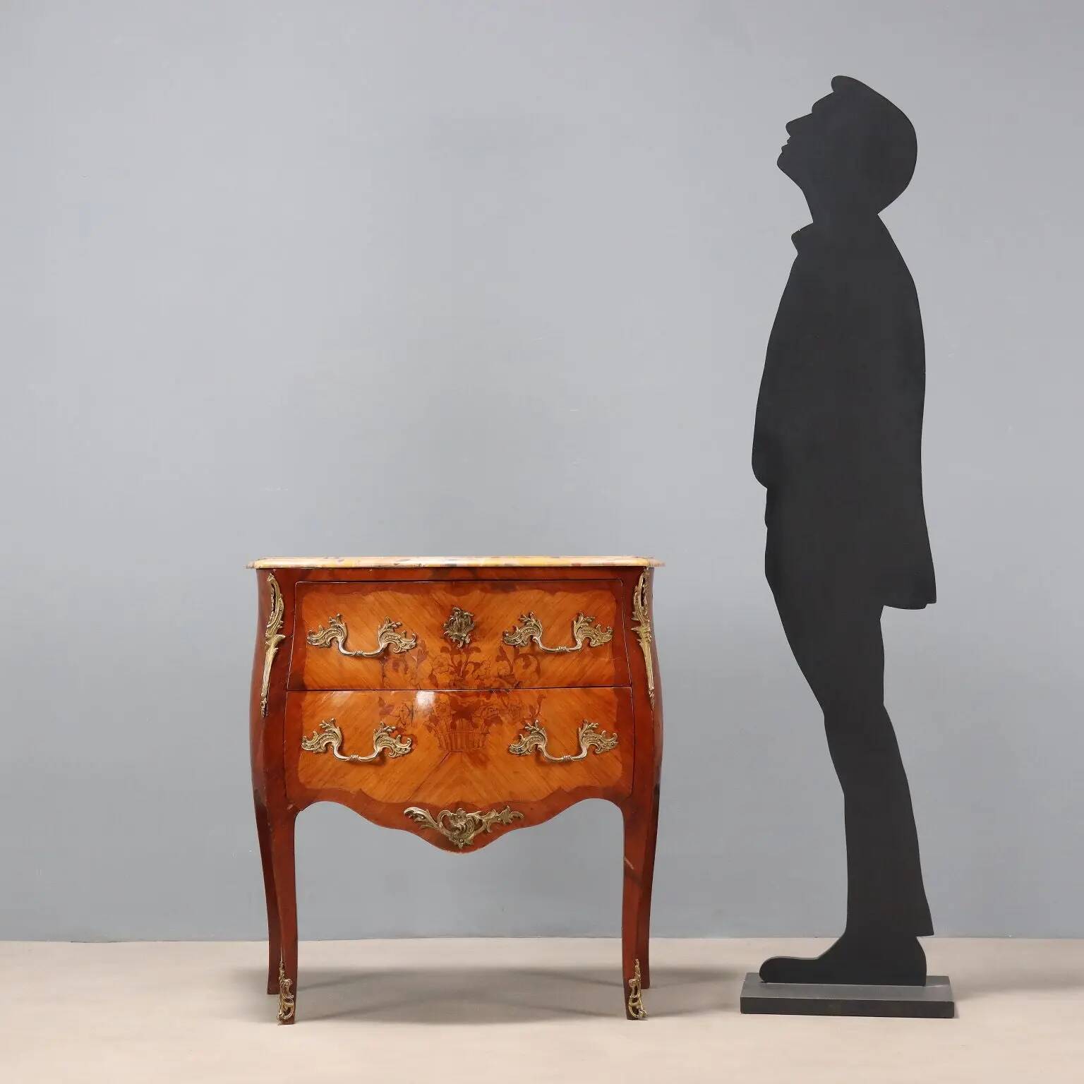 Antique commode in Baroque style made of mahogany, 20th century.