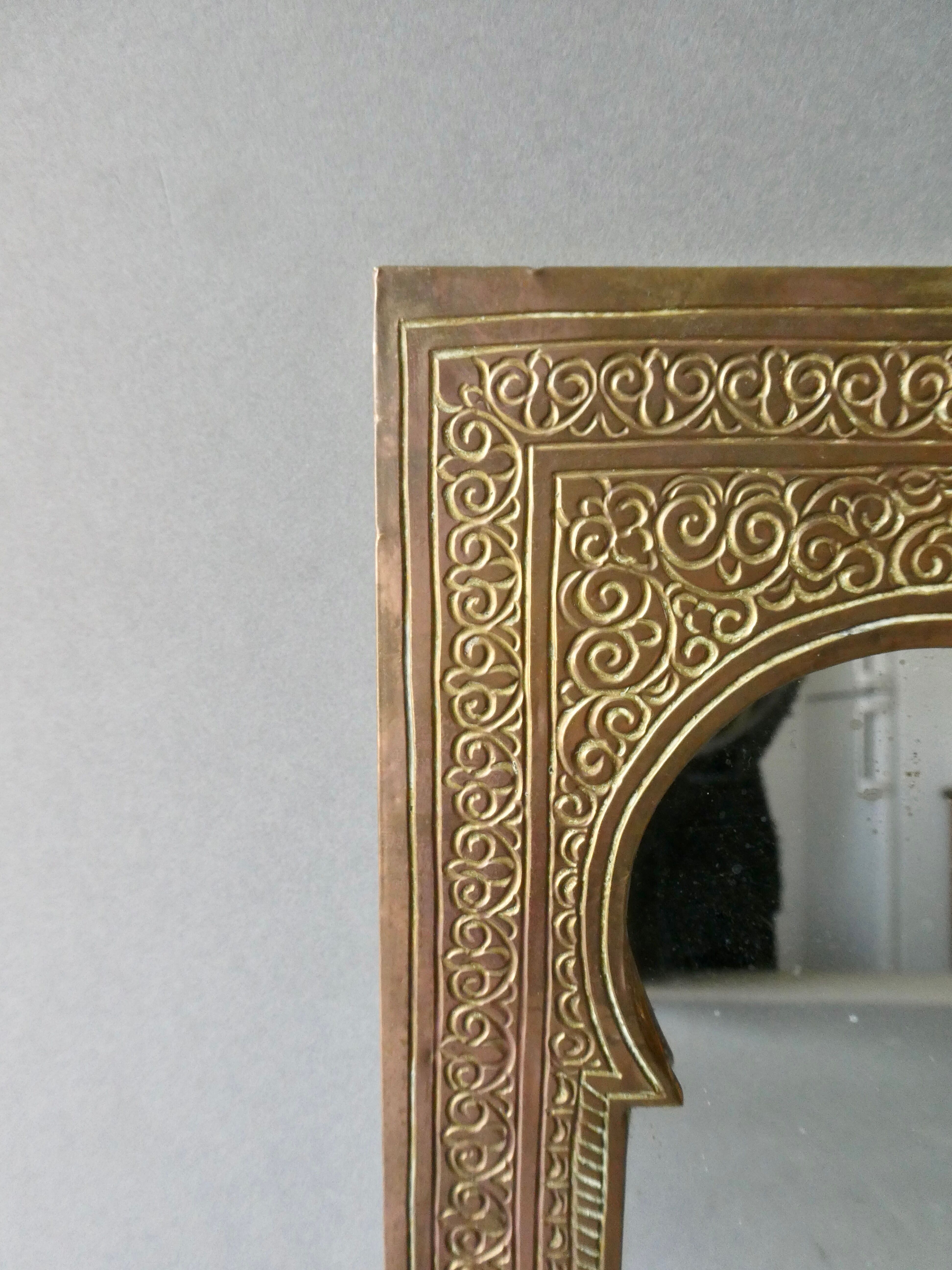 Moroccan mirror in chiseled brass, 70s