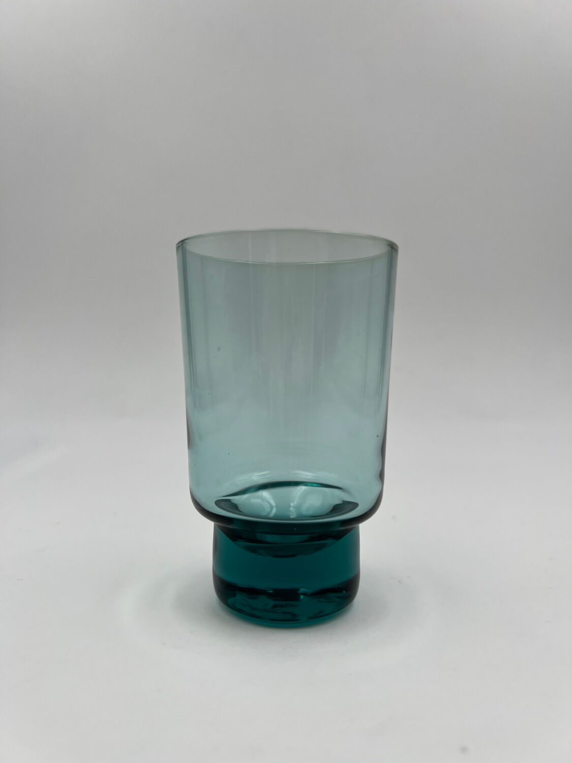 Eight bluish glass water glasses