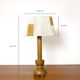 Wooden candle holder mounted as a lamp and its rope shade, 47.5cm.