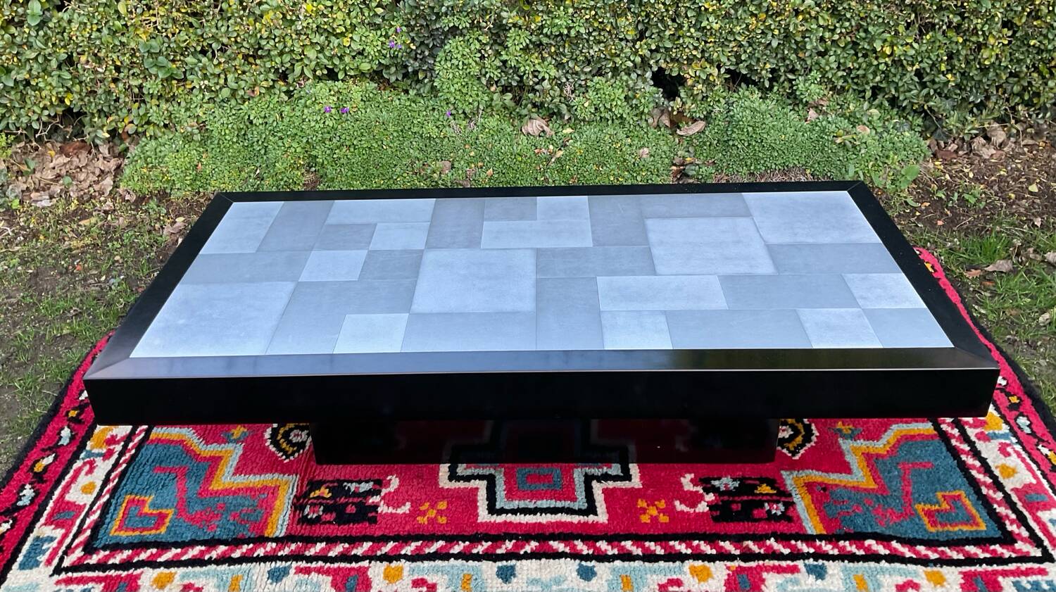 Vintage coffee table in stainless steel and black lacquered wood.