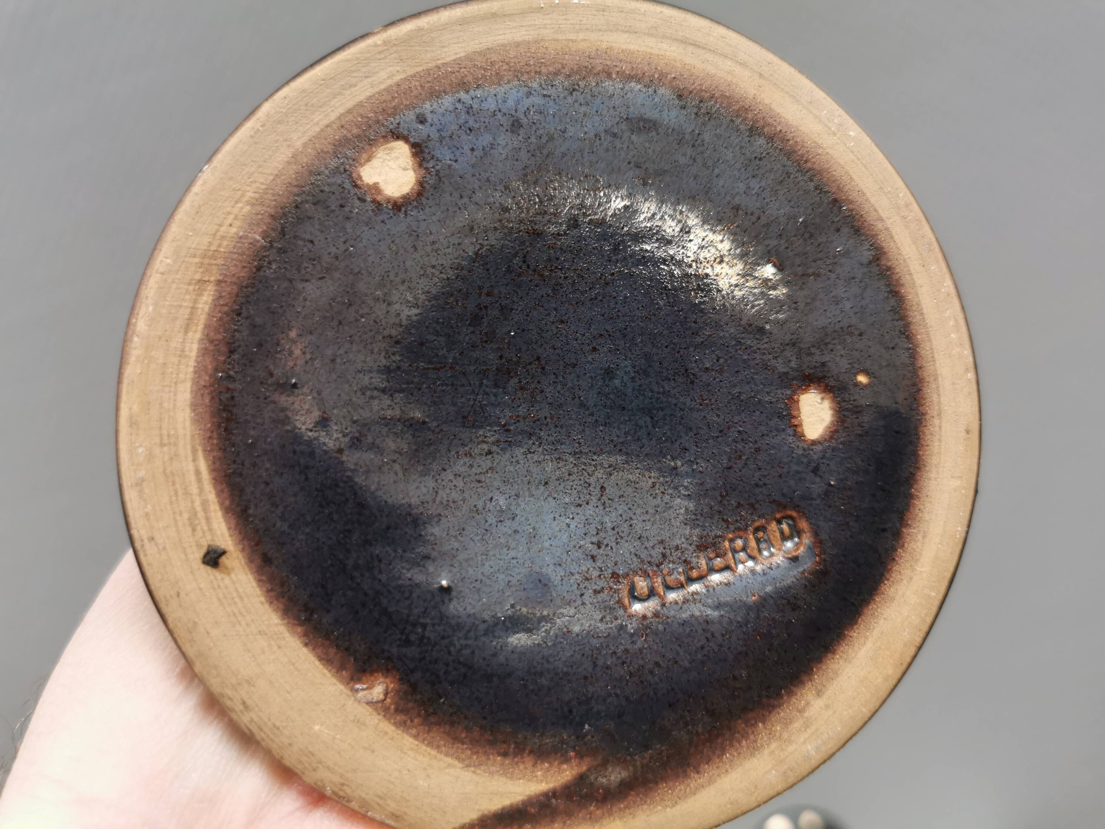 A set of ceramic candlesticks in bluish metallic glaze, Denmark 1980s