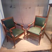 Pair of Louis XVI style armchairs upholstered in green leather.