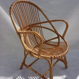 Armchair and footrest in rattan, years 50/60