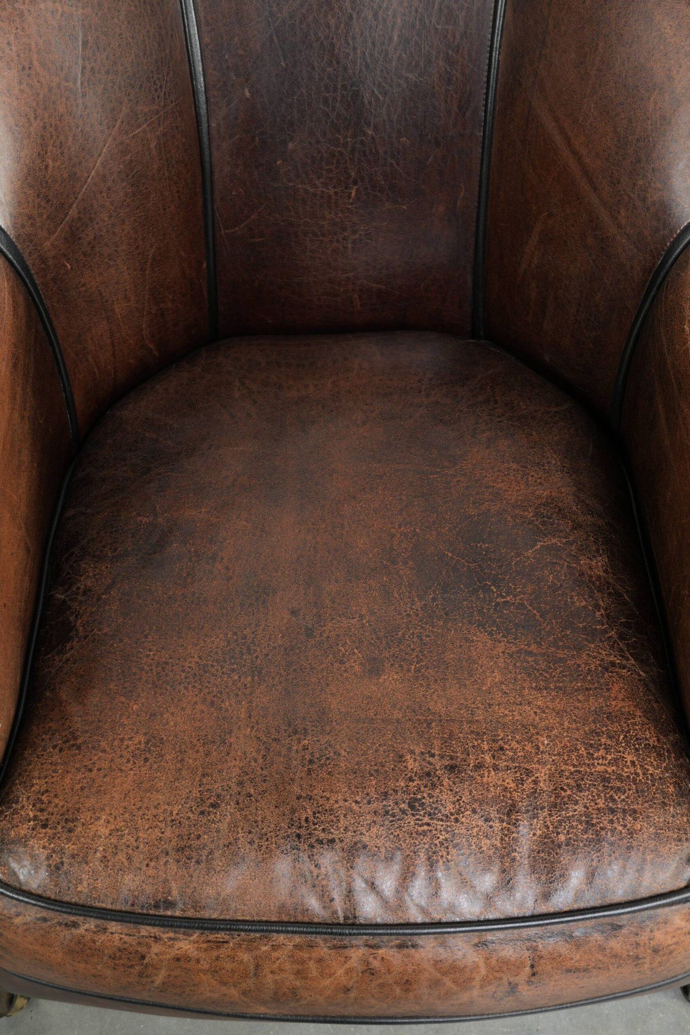 Vintage sheepskin armchair with a unique design and timeless appearance