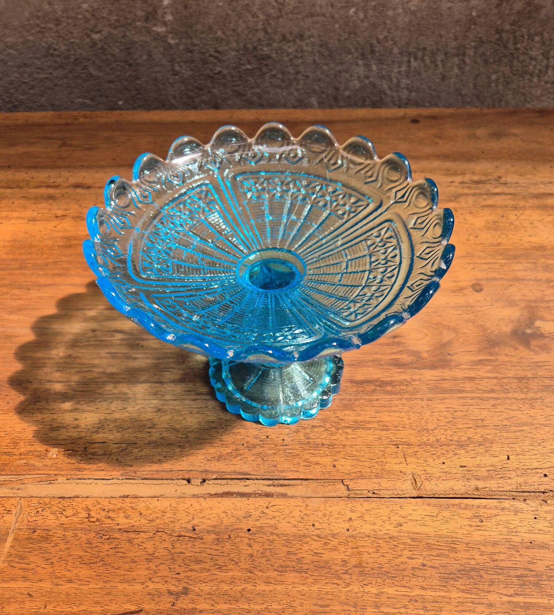 Blue glass footed fruit bowl.