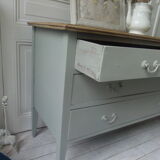 Green green vintage chest of drawers of gray, wood top.